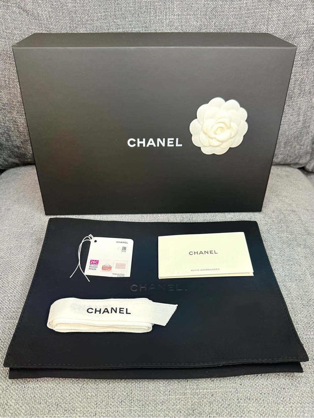 CHANEL BOX,dust bag,ribbon,camellia,booklet,retail tag and tissue paper.